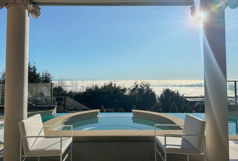 Pool terrace looking out over the water at a West Vancouver residence