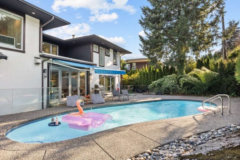 Garden and pool at a residence Luvilla operates in West Vancouver